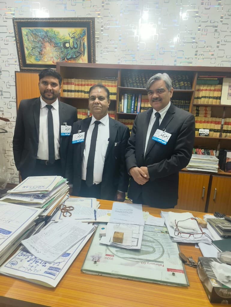 Ch. M. Ashfaq Bhullar in office setting at Bhullar International Law Company